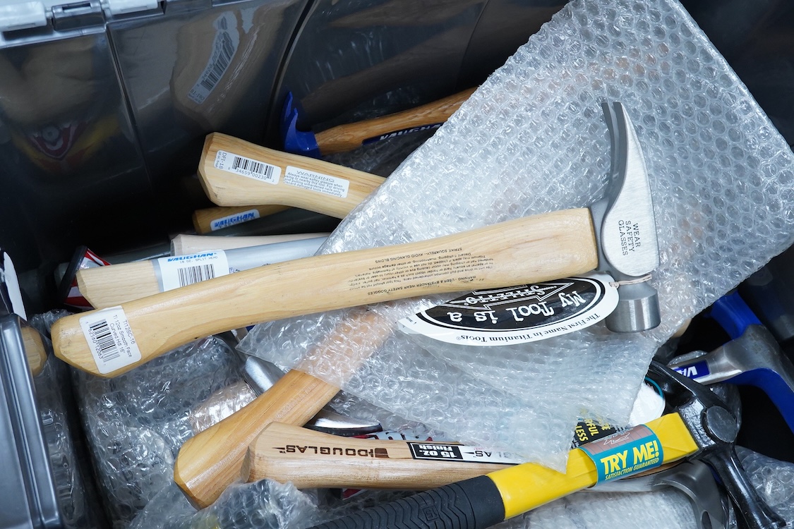 A collection of heavy duty hammers, framing hammers, and axes, including; 13 hammers by Vaughan, U.S.A., plus nine others by Stiletto, etc., and 14 carpenters axes and hatchets by James Howarth, Gransfars Bruks, Agdor of